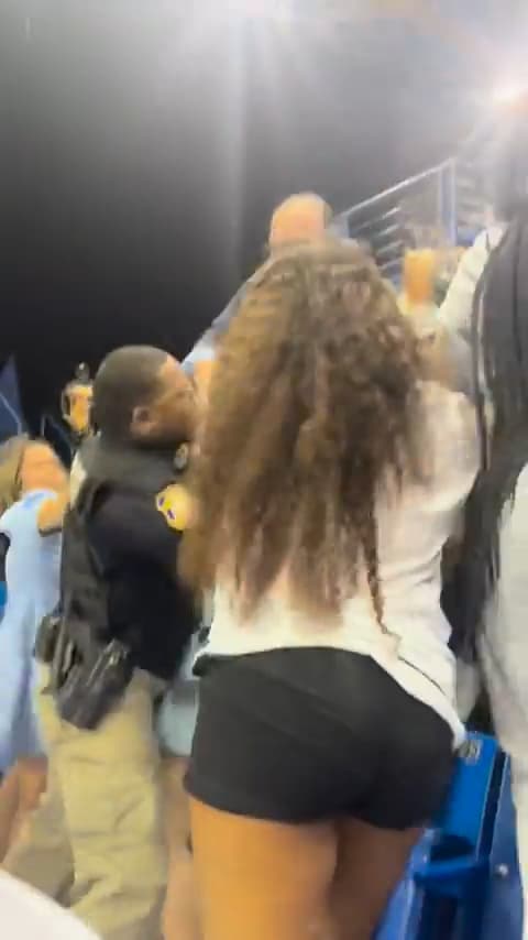 Man starts fight at graduation while holding a Baby thumbnail