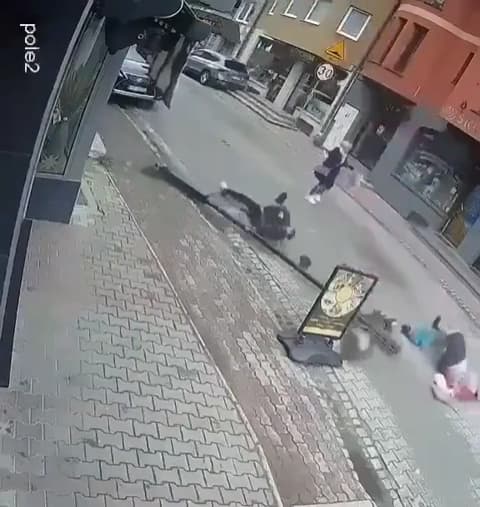 Shocking Moment: Man's Careless Lean Nearly Crushes Woman in Polish Town! thumbnail