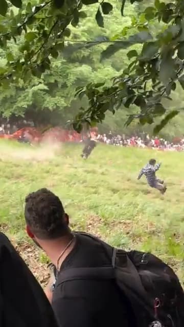 Chasing the cheese rolling down the hill thumbnail