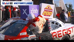 NASCAR Driver Connor Zilisch FALLS ON HIS NECK while getting out of his car in victory lane. thumbnail