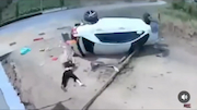 Crash shows a woman flying out of a car as it flips over thumbnail