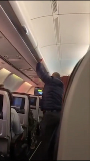 Man slapped mid-flight for thinking he could casually steal out of someone’s luggage! thumbnail