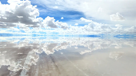 Salar de Uyuni in Bolivia is the world’s largest salt flat, stretching about 10,000 square kilometers. During the rainy season, a thin layer of water turns the flat into a giant natural mirror
