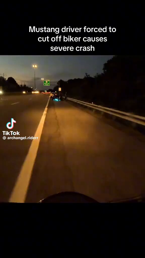 Mustang driver forced to cut off biker causes severe crash (Update: The biker survived the severe crash with no major injuries. Per an update from the TikTok creator (archangel.riderr), he was okay and discharged from the hospital the same day.)